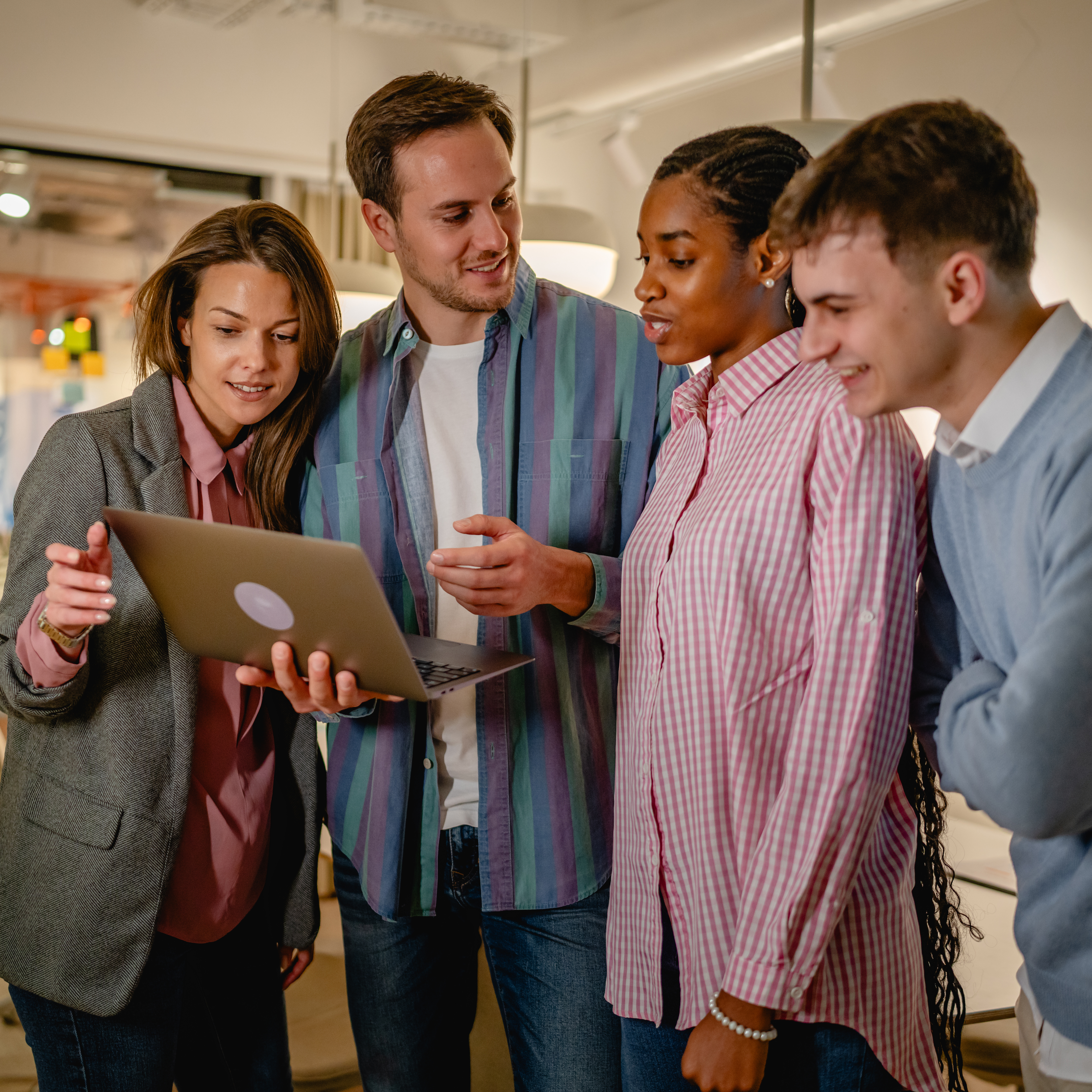 team of people working who look happy
